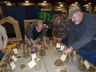 VT Farm Show attendees with jars